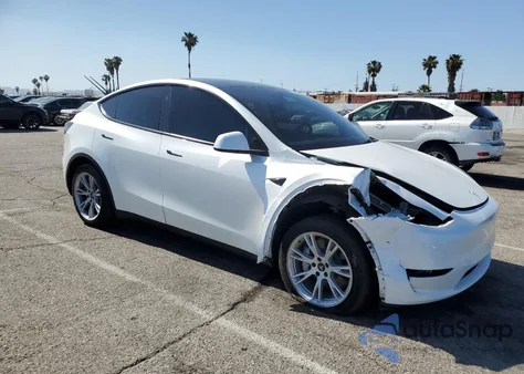 2023 Tesla Model Y from USA, damaged, VIN 7SAYGDEE5PA156623